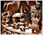 Musee du quai Branly Benin Detail d un siege en bois au centre le roi sous parasol